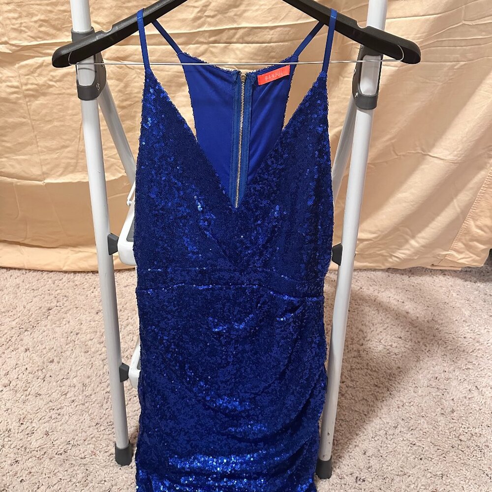 Blue sparkle mini dress with open sides and back held by stripes, Size M